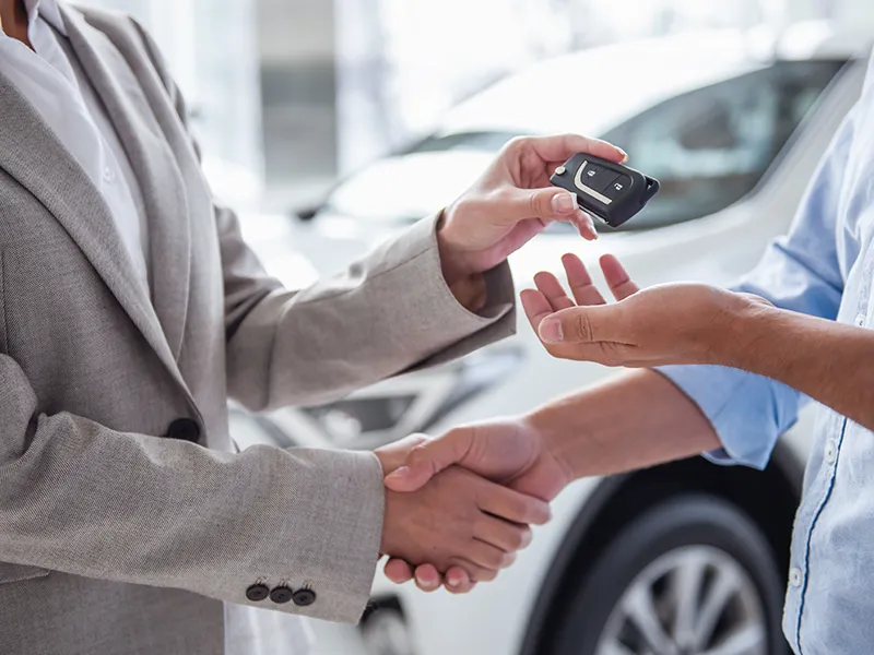 Keys being handed to the customer